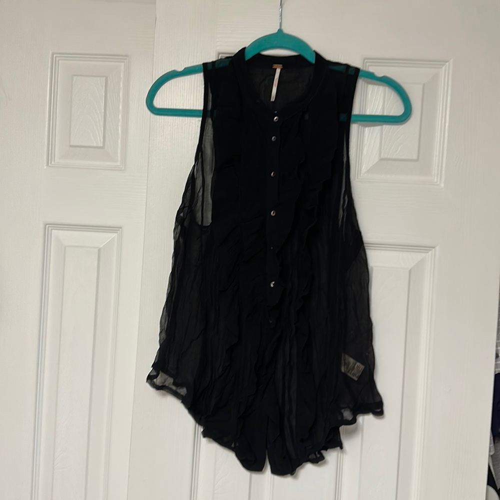 Free People sleeveless sheer blouse.